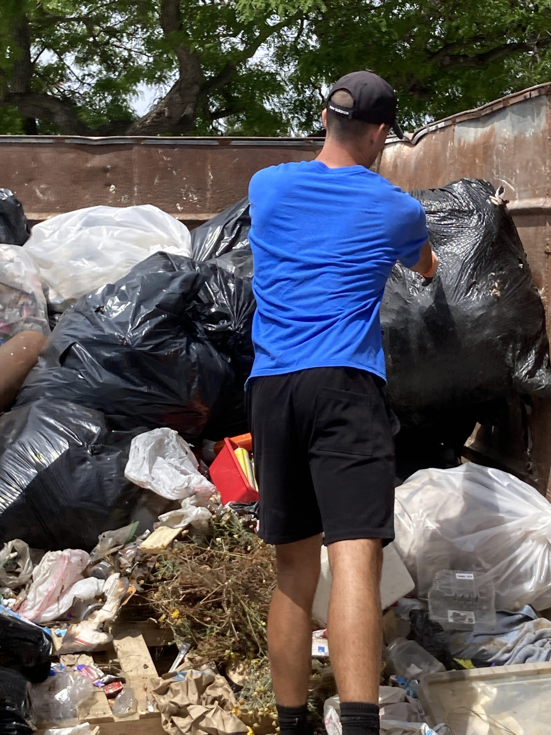 loading the dumpster