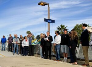 Community members and Council President LaCava making remarks on the Mike Gotch Bridge